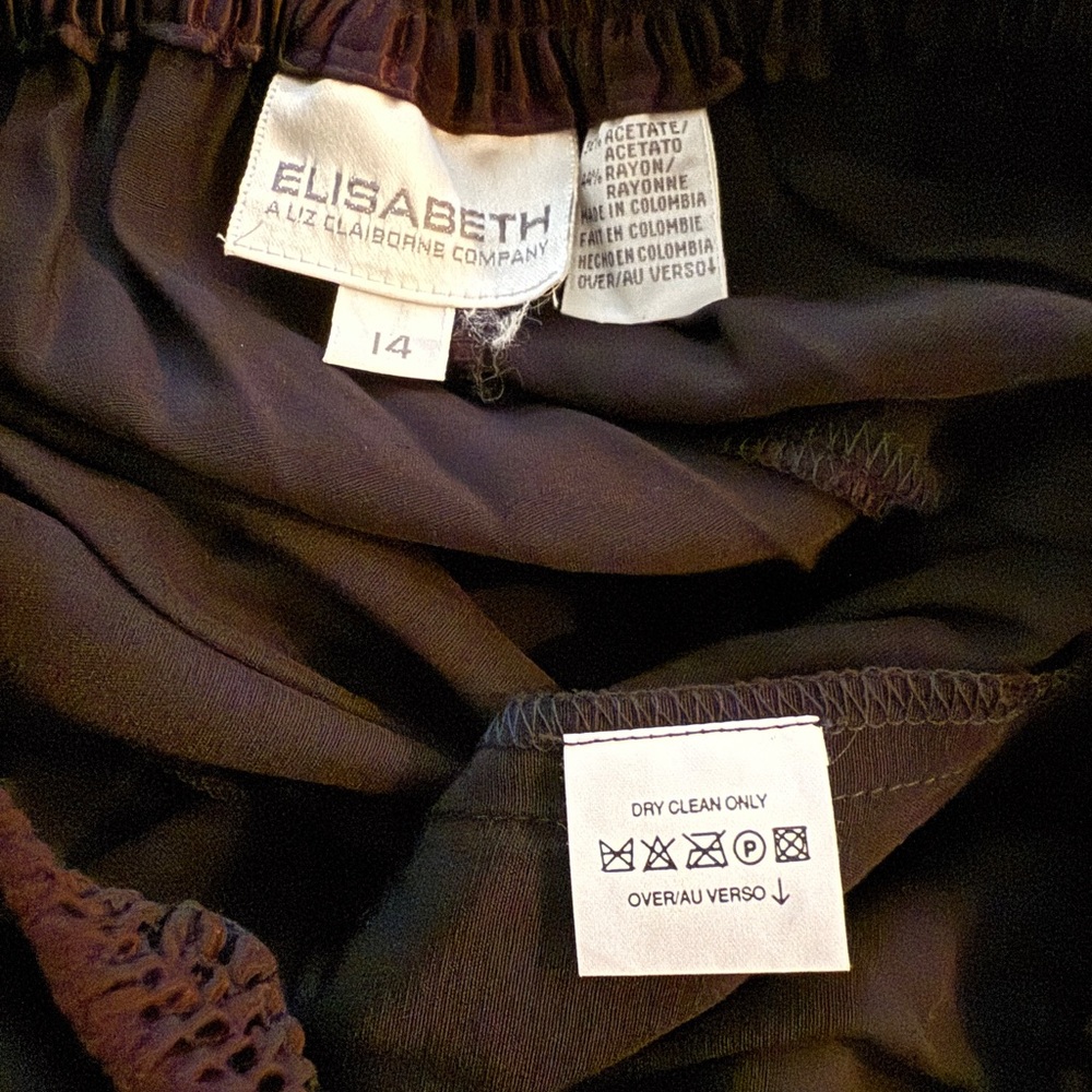 Elizabeth black satin pants. New with tag msg. Size 14. Great for the holidays